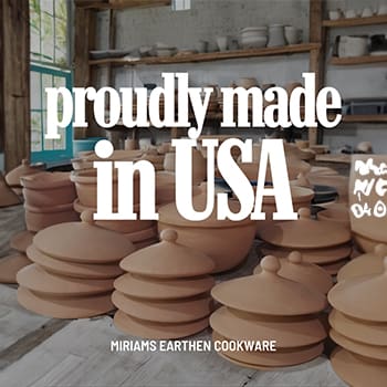Earthen cookware displayed with USA origin text.
